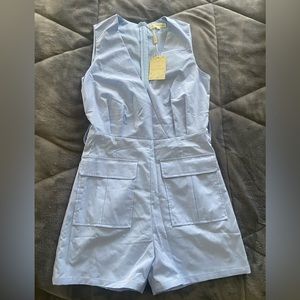 Baby blue romper with black belt